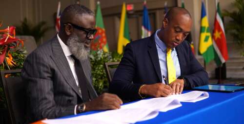 Caines signs tourism and energy memorandum - The Royal Gazette