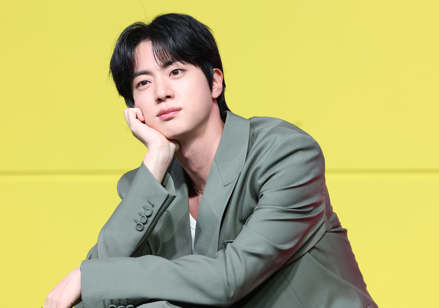 BTS member Jin poses at a press conference for Netflix's reality show Kian's Bizarre B&B on April 15. Jin has been selected as the K-pop star who contributed the most to promoting Korea’s tourism. [NEWS1]