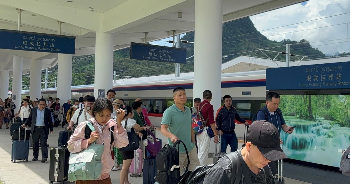 Chinese trains, tourists and money are flooding Laos. Laotians wonder if it makes sense