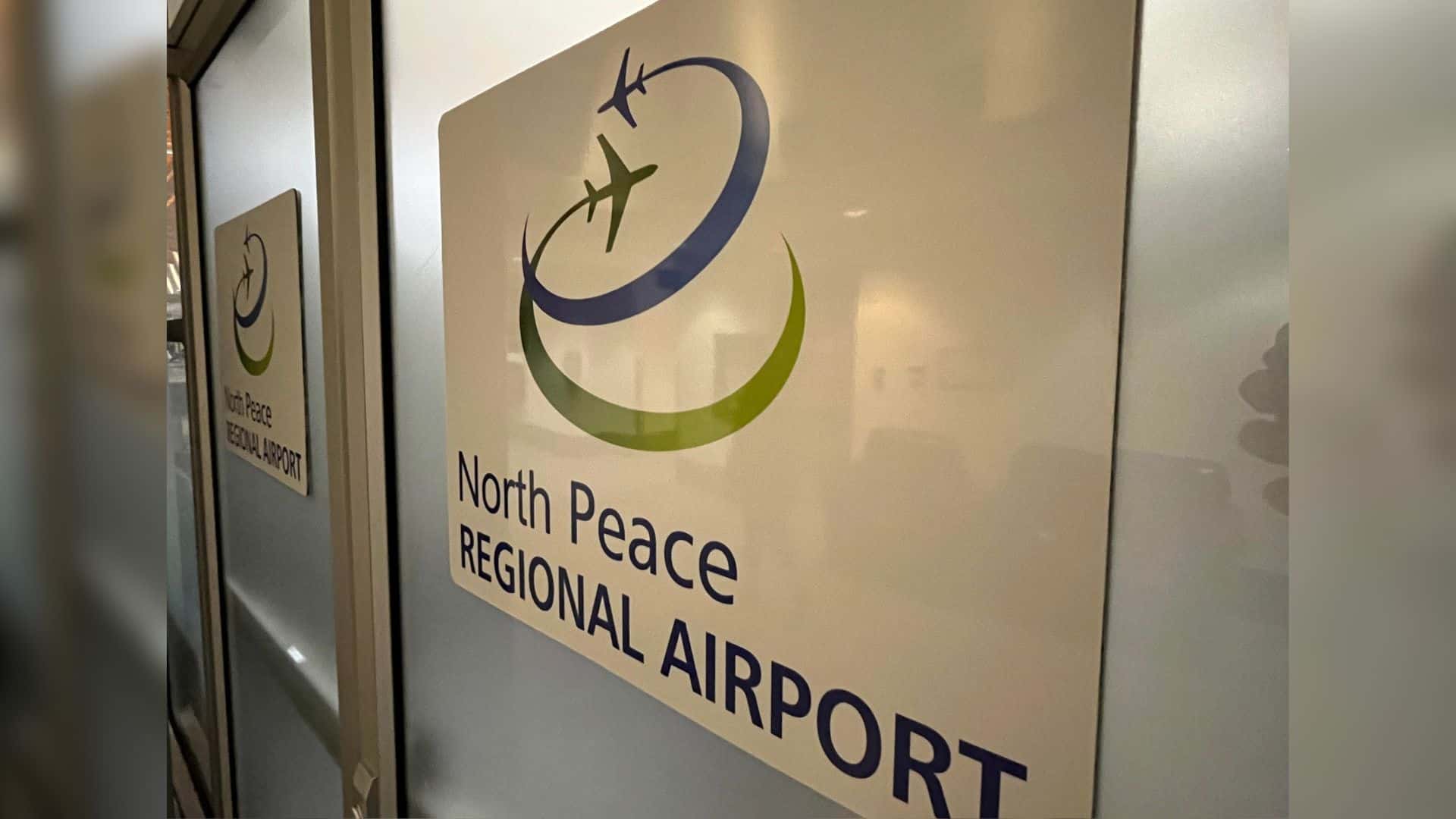 A sign for the North Peace Regional Airport.