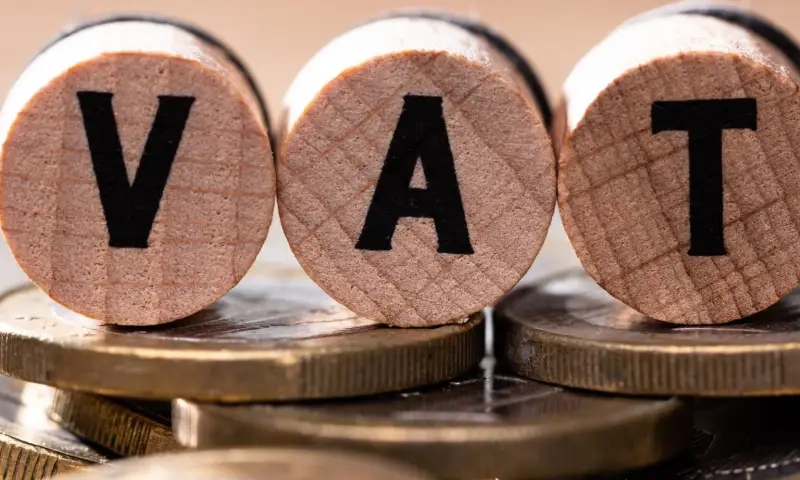 VAT spelled on round wooden blocks