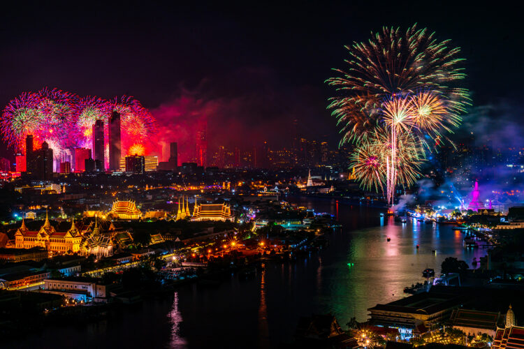 Fireworks illuminate the Bangkok skyline along the Chao Phraya River at night, celebrating the city’s recognition as the world’s most visited destination for international arrivals in 2025.