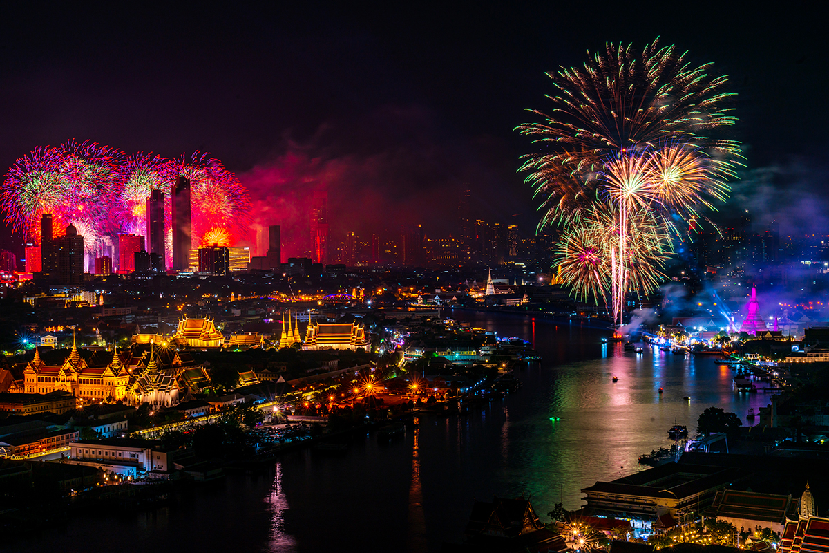 Fireworks illuminate the Bangkok skyline along the Chao Phraya River at night, celebrating the city’s recognition as the world’s most visited destination for international arrivals in 2025.