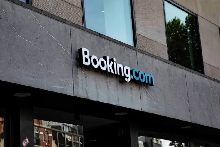 a sign on the side of a building that says booking.com