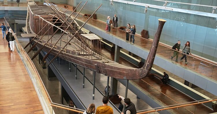 Egypt museum restores ancient boat as visitors watch