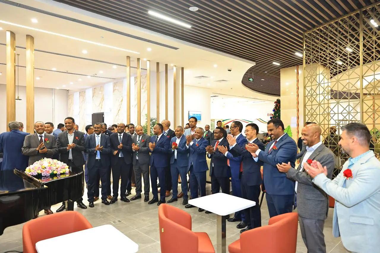 Officials and guests applaud during the opening ceremony of Ethiopian Airlines’ new premium lounge