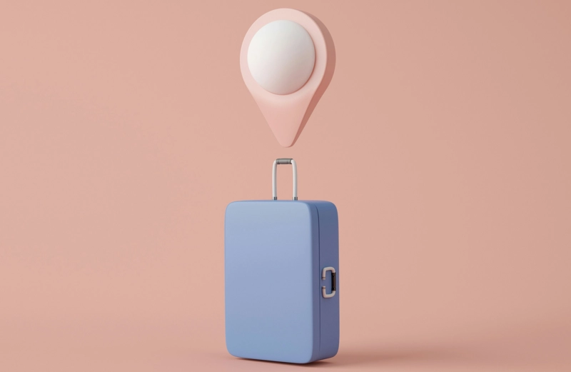 Graphic of a suitcase and a map marker