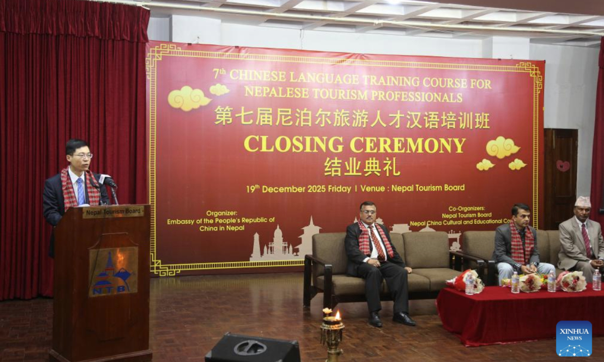 Zhou Pan, minister counselor of the Chinese Embassy in Nepal, speaks at the closing ceremony of the seventh Chinese Language Training Course for Nepalese Tourism Professionals in Kathmandu, Nepal, Dec. 19, 2025. A total of 47 Nepali tourism professionals received certificates at the conclusion of a Chinese language training session here on Friday. (Xinhua/Zhang Ping)