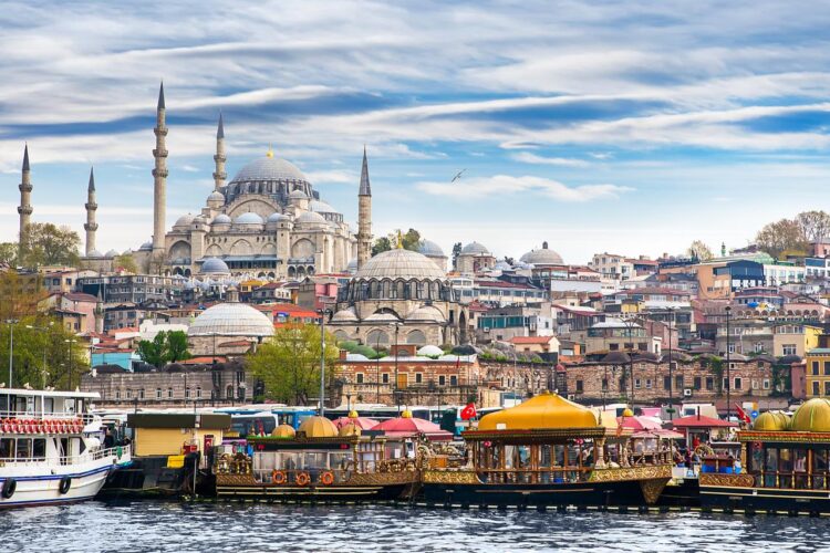 A view of the Golden Horn waterfront with the Suleymaniye Mosque in the background, in Istanbul, Türkiye. (Adobe Stock Photo)