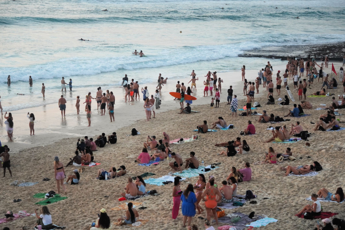 Tourists in Dreamland Beach in Bali
