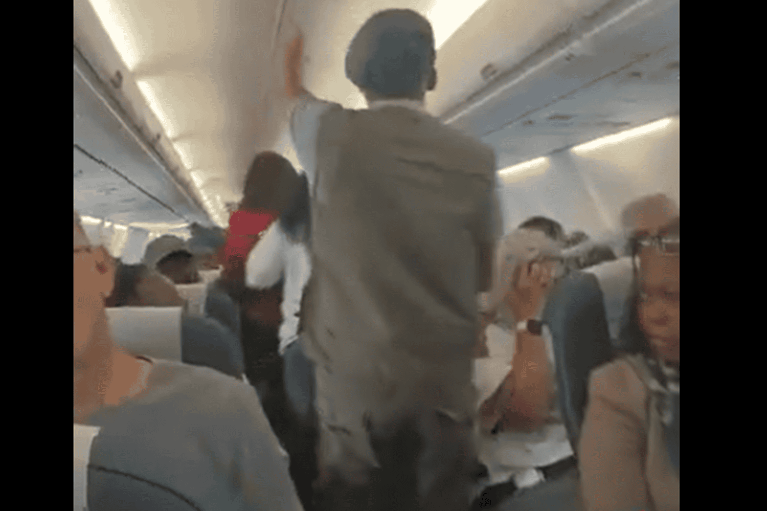 EFF supporters aboard a flight to East London. Picture: Screenshot