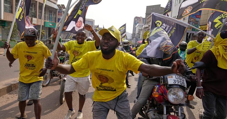 Supporters of Uganda's Yoweri Musseveni celebrate as secures seventh term in office