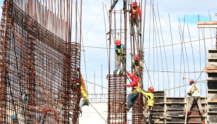 People working on a building