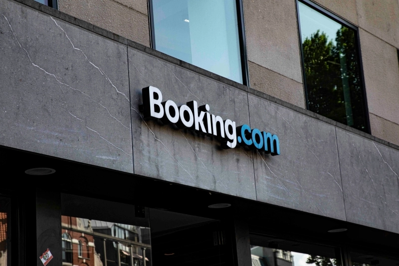 a sign on the side of a building that says booking.com