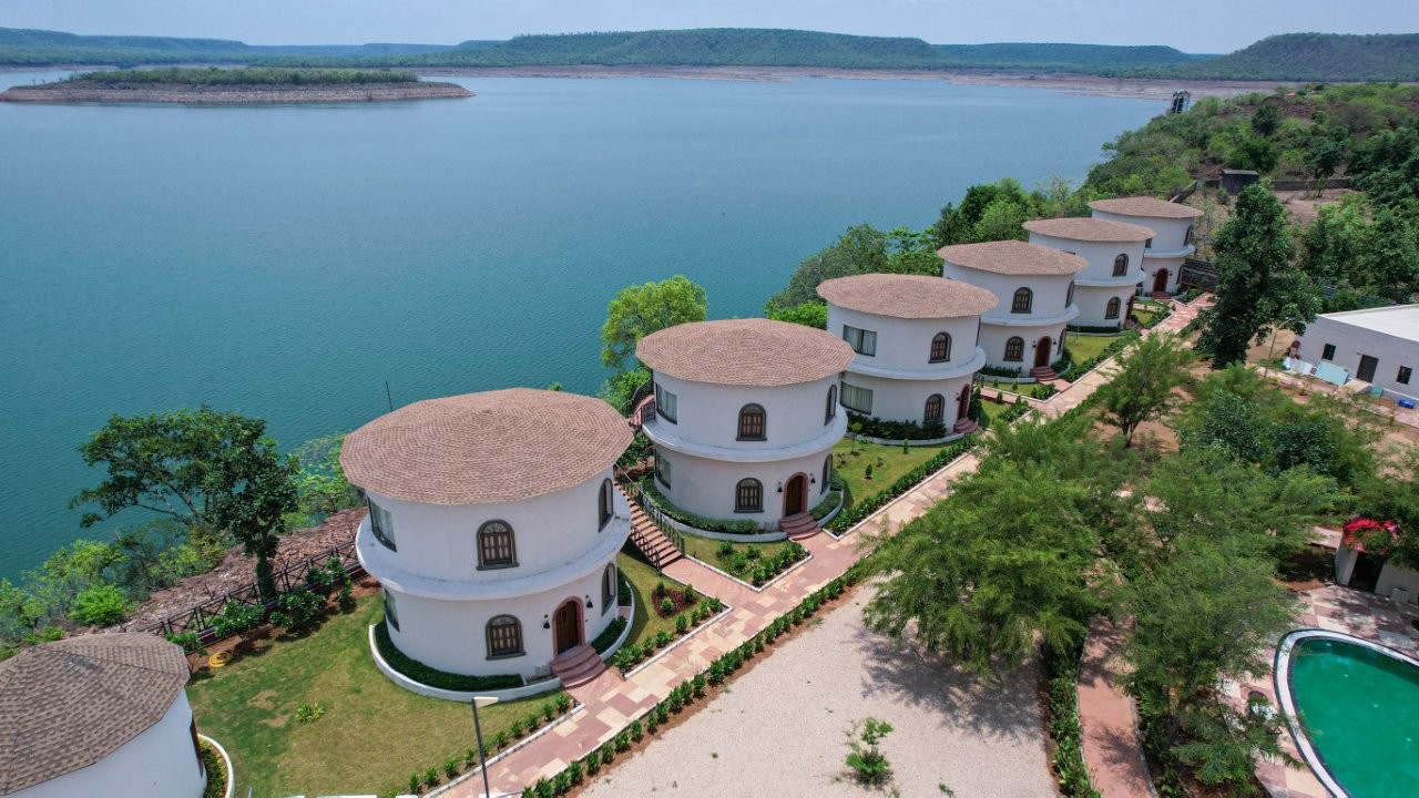 In a move set to transform tourism in madhya pradesh, narwar lakefront resort has just revealed a dramatic expansion that is bound to capture the attention of travel enthusiasts across india and beyond. This luxury lakeside retreat, nestled on the sindh river in shivpuri, now offers 41 keys, doubling its accommodation capacity, ensuring a seamless experience for larger groups, destination weddings, and corporate retreats. With the addition of 21 stunning new rooms, this expansion is poised to elevate regional tourism and hospitality to unparalleled heights. As narwar lakefront resort moves into a new chapter, it isn’t just increasing its guest count—it is redefining luxury and experiential travel in the heart of madhya pradesh. Located just a stone’s throw from the madhav tiger reserve and madhav national park, the resort is a gateway to india’s untouched natural beauty, heritage, and wildlife experiences. For those looking to unwind and indulge in a premium stay, narwar lakefront resort is now a destination of choice. With its cutting-edge expansion, the resort seamlessly combines modern comforts with the untouched tranquility of nature, delivering a world-class experience like never before. Let’s dive deeper into why this expansion is one of the most exciting developments for tourism in madhya pradesh. 21 new luxury rooms – a bold leap forward for regional tourism in shivpuri the much-awaited expansion at narwar lakefront resort includes 21 additional lakefront cottages and rooms, pushing the resort’s capacity to 41 keys, creating an unmatched opportunity for regional tourism. With madhya pradesh rapidly gaining attention as a top tourism destination, this strategic expansion is set to boost the state's hospitality industry, creating new tourism hubs and attracting visitors from across the globe. Each new room is designed to offer an intimate, yet luxurious escape into nature, with modern furnishings, warm wooden flooring, and expansive balcony views of the tranquil sindh river. It’s a perfect blend of contemporary luxury and nature, giving visitors the freedom to immerse themselves in the serene environment while enjoying first-class amenities. Narwar lakefront resort is now equipped to accommodate large groups, including corporate offsites and destination weddings, making it one of the most sought-after venues for luxury travel in the us tourism sector. This expansion isn’t just about increasing the number of rooms—it's about creating new opportunities for tourism in madhya pradesh and making the resort a pivotal destination for people looking to explore heritage, nature, and luxury travel all at once. Destination weddings and curated retreats – narwar lakefront resort as the ultimate venue with 21 additional rooms, narwar lakefront resort can now easily cater to destination weddings, corporate retreats, and wellness-led stays. This expansion elevates the resort into a premier destination for large-scale celebrations, offering everything a couple or business group could need: a stunning setting, first-class amenities, and the ability to host memorable events surrounded by lush greenery and the serene sindh river. The resort’s ability to host experiential travel and curated retreats is now at an all-time high. The addition of new accommodations ensures luxurious stays, with the added ability to host large groups without compromising the personalized environment that narwar lakefront is known for. Navneet sharma, ceo of lion group, explains that this expansion is a testament to their commitment to offering experiential travel where guests can fully immerse themselves in the beauty of the land and its rich heritage. For those seeking a destination wedding that blends luxury, nature, and heritage, narwar lakefront resort is now one of the most desirable venues in india, making it a must-visit spot for people seeking unique experiences and unforgettable moments. A new chapter for experiential travel in madhya pradesh – a growing hub for luxury tourism the growing popularity of luxury, nature-driven escapes means that narwar lakefront resort is uniquely positioned to offer more than just accommodation—it provides immersive experiences that cater to all types of travelers. From those seeking peace and tranquility by the lakefront to those looking to immerse themselves in the rich heritage of shivpuri, this expansion reflects a shift toward experiential tourism. Set against the backdrop of the madikheda dam and sindh river, the resort offers guests an opportunity to explore madhya pradesh’s natural beauty, from the madhav national park to the madhav tiger reserve. Guests can enjoy a range of activities, including wildlife safaris, boating experiences, and visits to the nearby historic sites. It’s the perfect combination of leisure travel and adventure, and now with increased room capacity, it’s easier than ever to experience it all. By expanding, the resort not only boosts its ability to host larger groups but also strengthens madhya pradesh’s tourism infrastructure, positioning the state as an emerging hub for destination tourism in central india. Strengthening the local economy – job creation and regional development in addition to offering unmatched luxury and hospitality, the expansion of narwar lakefront resort is expected to have a major impact on the local economy. With more rooms comes increased employment, vendor partnerships, and greater support for local businesses. The narwar lakefront resort’s expansion will create more jobs in the tourism sector, from resort staff to local artisans and businesses that support the hospitality industry. As tourism in madhya pradesh grows, the resort’s influence will extend beyond just its immediate surroundings. It will bring more attention to shivpuri and madhya pradesh, making the state a go-to destination for those looking for an authentic, nature-based luxury experience. This is good news for regional tourism as it ensures long-term sustainability and growth in the area. Key amenities at narwar lakefront resort – redefining luxury stays in madhya pradesh the newly expanded narwar lakefront resort boasts an array of premium amenities designed to enhance the guest experience. These include pet-friendly cottages, multiple dining options, and a swimming pool, as well as a fitness center for guests who want to stay active. For families traveling with children, there’s a dedicated kids' play area to ensure everyone has a memorable experience. Whether you’re seeking a romantic getaway, a family vacation, or a wellness retreat, the resort’s state-of-the-art facilities are the perfect complement to the breathtaking natural surroundings. Conclusion – narwar lakefront resort: the new face of luxury tourism in madhya pradesh with its stunning lakeside views, 21 new luxury rooms, and expanded capacity, narwar lakefront resort is undoubtedly on its way to becoming a top destination in india’s hospitality scene. The expansion promises to attract both indian and international travelers, offering them a one-of-a-kind experience that blends luxury, nature, and heritage in the heart of madhya pradesh. As madhya pradesh tourism continues to thrive, narwar lakefront resort is setting a new standard in experiential luxury travel and destination events, ensuring that the state remains one of the top choices for leisure tourism in india.