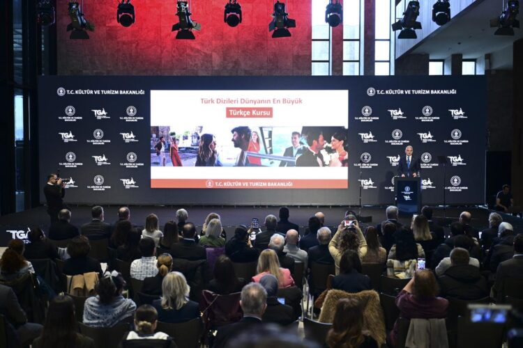 Culture and Tourism Minister Mehmet Nuri Ersoy speaks during a program on supporting Turkish TV series contributing to global tourism promotion at the Ataturk Cultural Center in Istanbul, Türkiye, Feb. 18, 2026. (AA Photo)