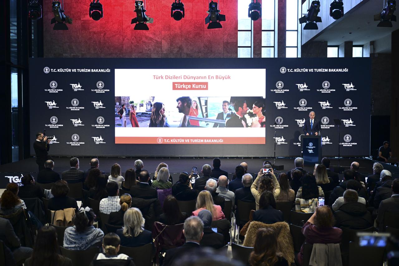 Culture and Tourism Minister Mehmet Nuri Ersoy speaks during a program on supporting Turkish TV series contributing to global tourism promotion at the Ataturk Cultural Center in Istanbul, Türkiye, Feb. 18, 2026. (AA Photo)