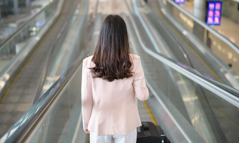A business woman at an International airport