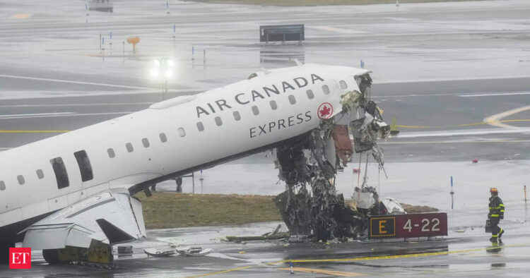 Watch: Chilling video of Air Canada Express flight colliding with fire truck at New York's LaGuardia...