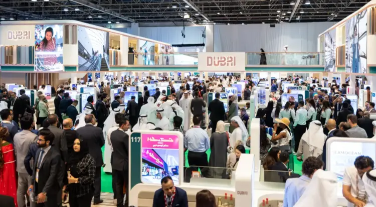 Crowded exhibition at the ATM in Dubai stand.