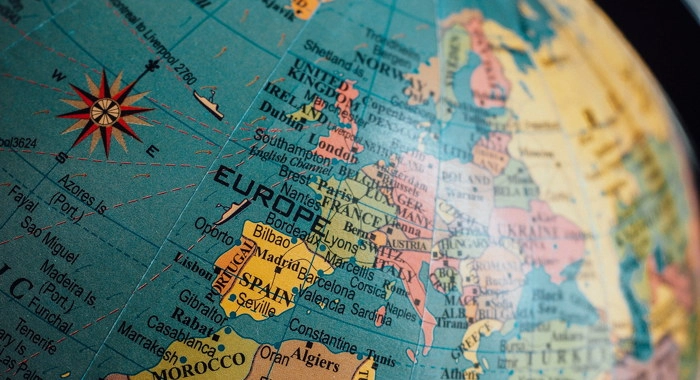 Globe focused on Europe - Photo by Tom Grimbert on Unsplash