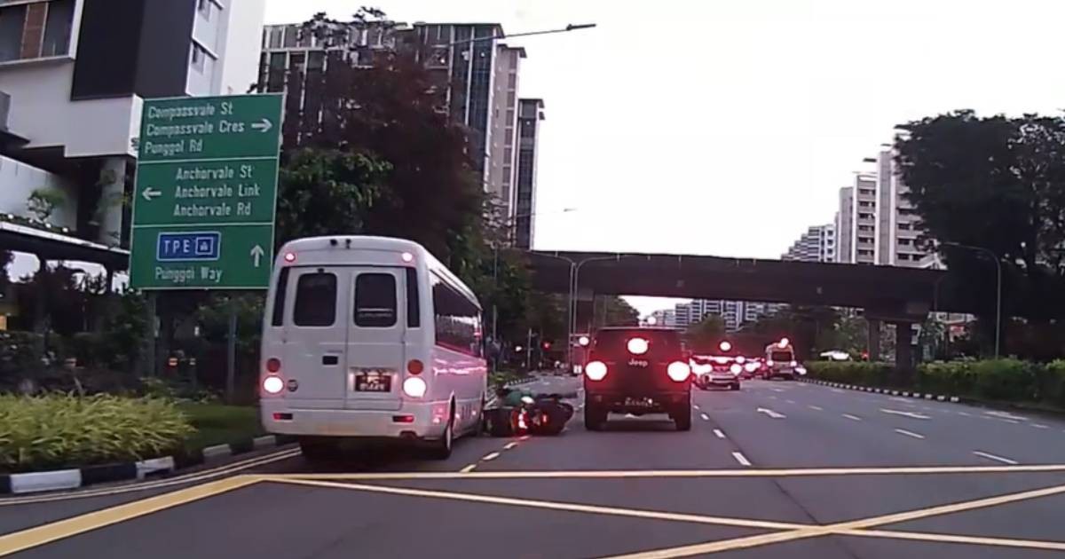 Motorcyclist escapes death after colliding with car, nearly run over by minibus in Sengkang, Singapo...