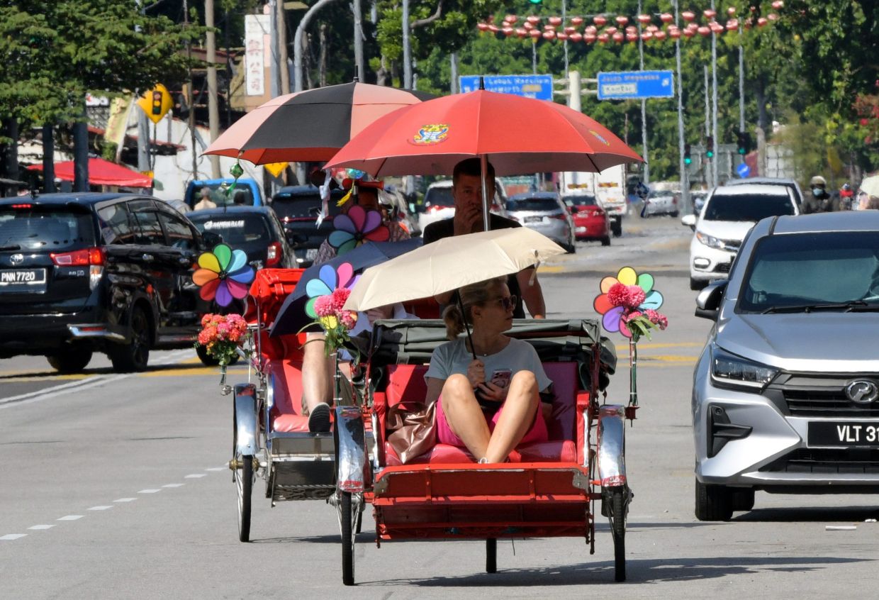 Trishaw rides still popular in Penang as hot weather fails to deter tourists
