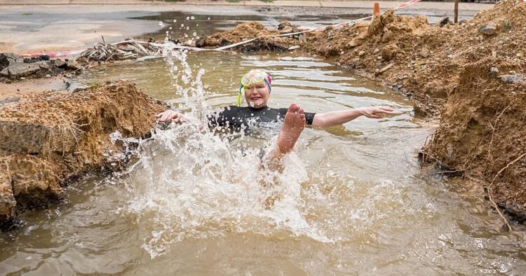 South African politician takes dip in pothole to show city management failures