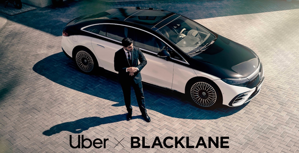 uber blacklane black and white limo with driver