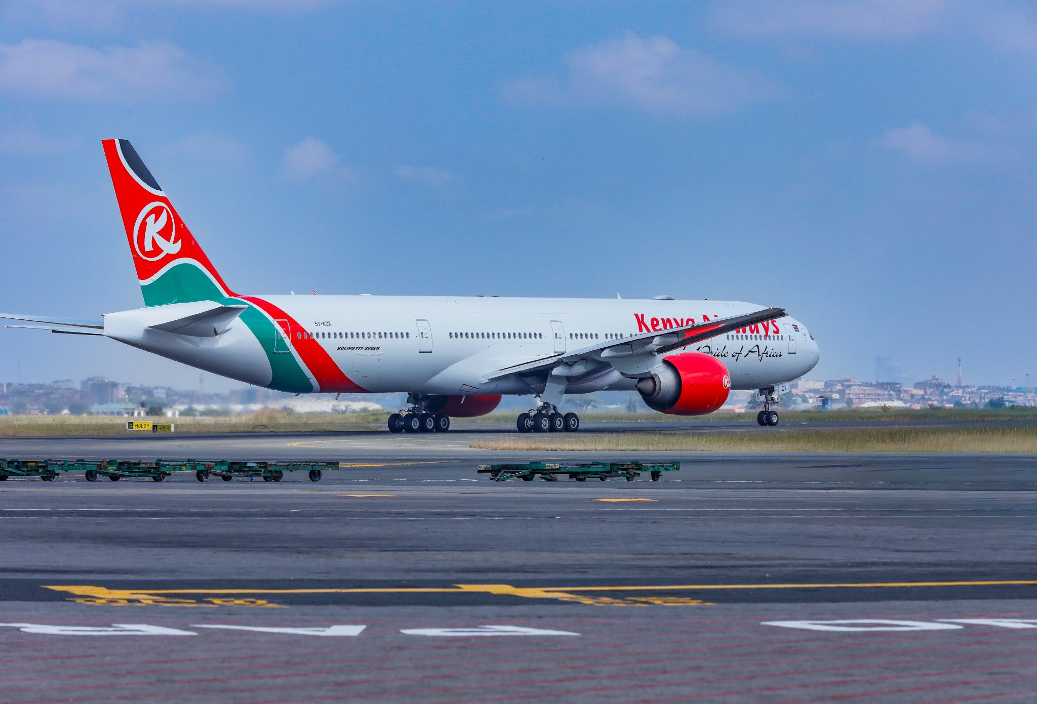 Kenya Airways Boeing 777-300ER taxis at Jomo Kenyatta International Airport after returning from a decade-long lease ahead of scheduled Nairobi-London Heathrow service.