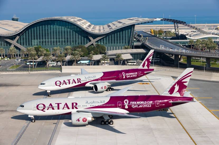 Qatar airways planes at dubai airport, enhancing global travel connectivity.