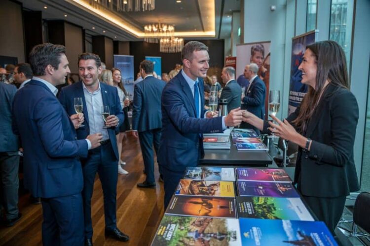 Trade professionals network at uk trade roadshow event.